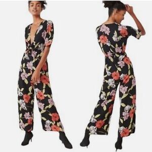 Urban Outfitters floral jumpsuit M deep v neck